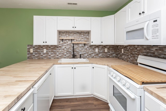 187 E 2300 N, North Ogden, UT 84414 - kitchen with visible vents, a sink, light countertops, white appliances, and decorative backsplash