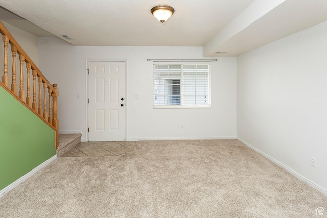 187 E 2300 N, North Ogden, UT 84414 - carpeted foyer featuring stairway, visible vents, and baseboards