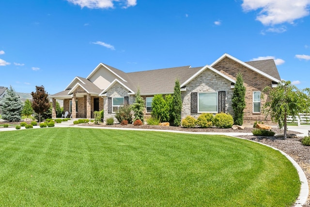 1375 S Red Filly Rd, Heber City, UT 84032 - view of front of home with a front yard, brick siding, and stone siding