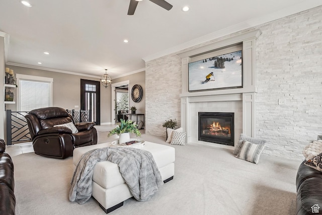 1375 S Red Filly Rd, Heber City, UT 84032 - living area featuring recessed lighting, a tiled fireplace, crown molding, ceiling fan, and carpet
