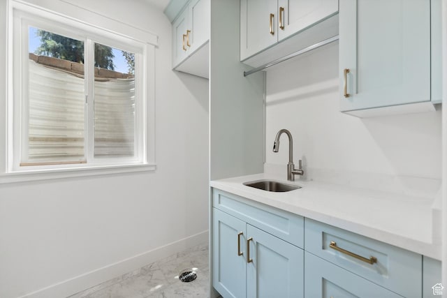 1375 S Red Filly Rd, Heber City, UT 84032 - laundry area with marble finish floor, a sink, and baseboards