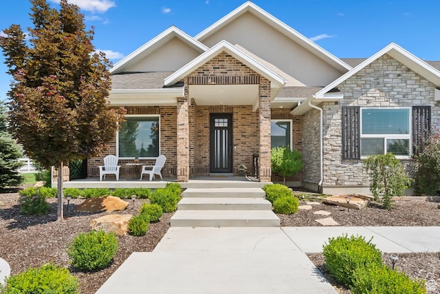 1375 S Red Filly Rd, Heber City, UT 84032 - craftsman-style home with a shingled roof and stone siding