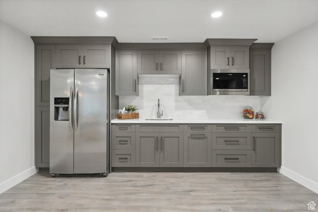 1375 S Red Filly Rd, Heber City, UT 84032 - kitchen featuring stainless steel fridge with ice dispenser, gray cabinetry, and built in microwave