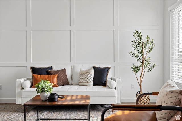 2124 N 2525 W, Clinton, UT 84015 - living area with a decorative wall