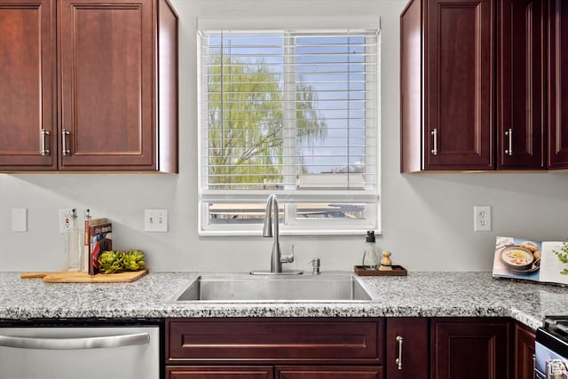 2124 N 2525 W, Clinton, UT 84015 - kitchen with stainless steel dishwasher, gas range, a sink, and dark brown cabinets