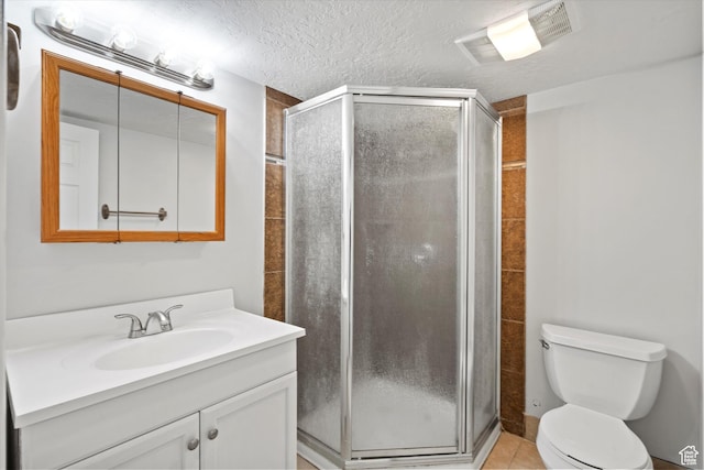 2124 N 2525 W, Clinton, UT 84015 - full bath featuring vanity, a stall shower, a textured ceiling, toilet, and visible vents