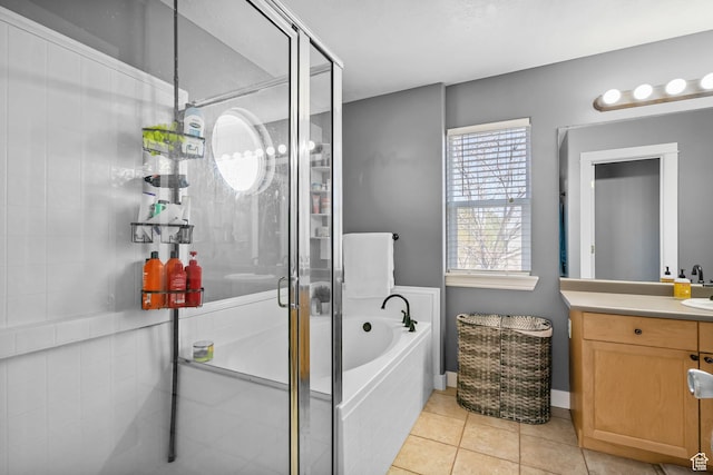 1468 N 220 W, Tooele, UT 84074 - bathroom with vanity, baseboards, a stall shower, tile patterned floors, and a garden tub