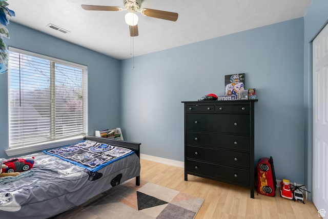 1468 N 220 W, Tooele, UT 84074 - bedroom featuring visible vents, baseboards, light wood finished floors, and ceiling fan