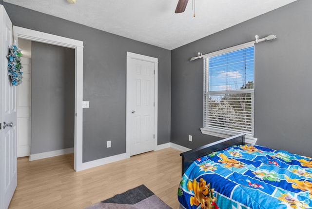 1468 N 220 W, Tooele, UT 84074 - bedroom featuring light wood finished floors, baseboards, and ceiling fan