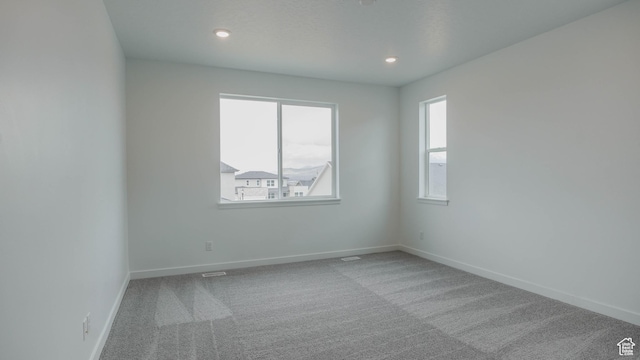 876 W Sika Cir S Unit 205, Saratoga Springs, UT 84045 - empty room with carpet floors and recessed lighting