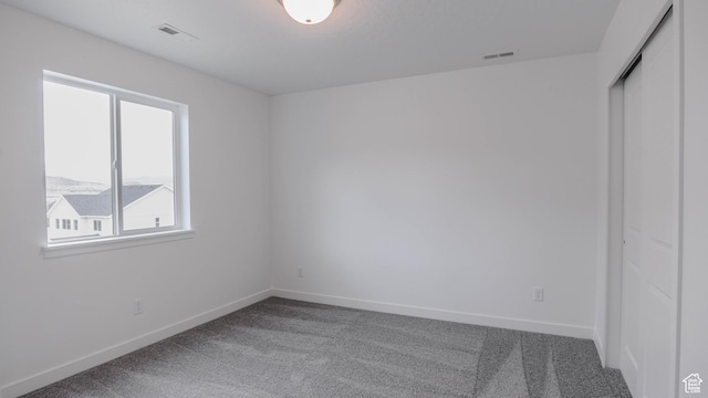 876 W Sika Cir S Unit 205, Saratoga Springs, UT 84045 - carpeted empty room with baseboards