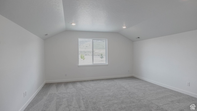 876 W Sika Cir S Unit 205, Saratoga Springs, UT 84045 - bonus room featuring lofted ceiling and carpet floors