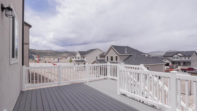 876 W Sika Cir S Unit 205, Saratoga Springs, UT 84045 - wooden deck featuring a residential view and a mountain view
