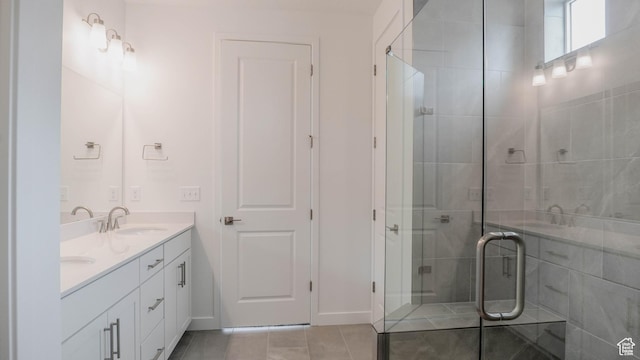876 W Sika Cir S Unit 205, Saratoga Springs, UT 84045 - bathroom with double vanity, a shower stall, and tile patterned flooring