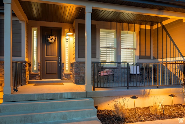 814 N 1490 E, Heber City, UT 84032 - view of exterior entry featuring a porch and stone siding