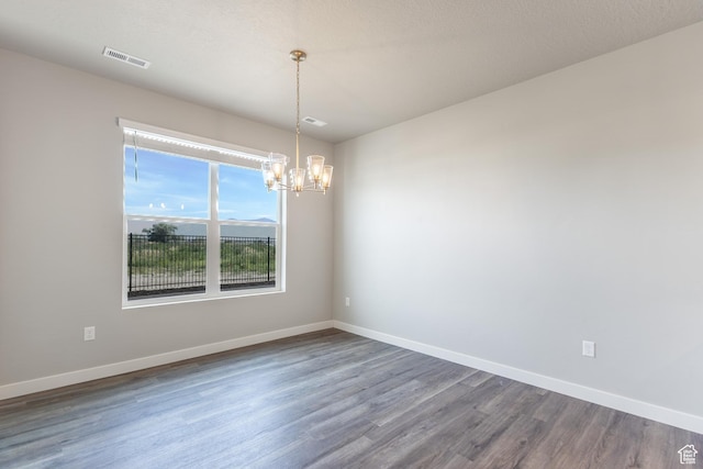 3778 S 4250 W Unit 435, West Haven, UT 84401 - spare room featuring a chandelier and dark wood-style flooring