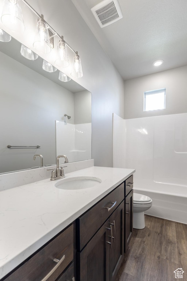 3778 S 4250 W Unit 435, West Haven, UT 84401 - bathroom with vanity, wood finished floors, shower / tub combination, and recessed lighting