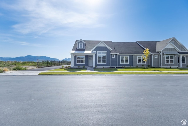 3778 S 4250 W Unit 435, West Haven, UT 84401 - townhome / multi-family property featuring board and batten siding, a mountain view, and a front lawn