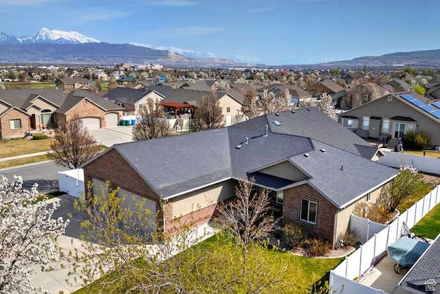 bird's eye view with a mountain view and a residential view