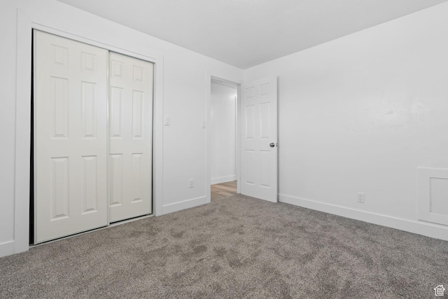 621 N 200 W, Clearfield, UT 84015 - unfurnished bedroom with a closet, carpet flooring, and baseboards