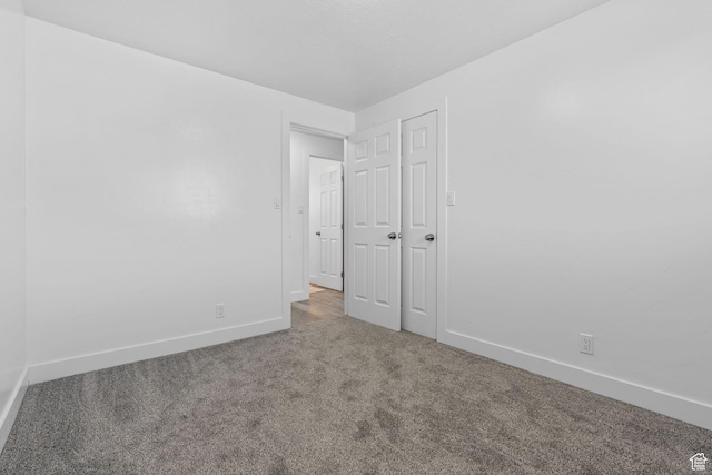 621 N 200 W, Clearfield, UT 84015 - unfurnished bedroom with baseboards and carpet floors