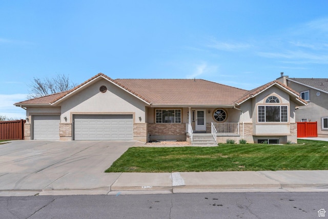 492 W 175 N, Orem, UT 84057 - single story home with stucco siding, driveway, a front lawn, a tile roof, and a garage