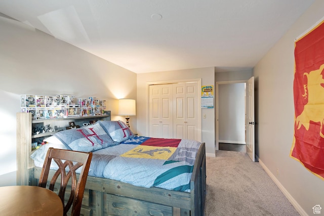 819 N Juniperpoint Dr, Salt Lake City, UT 84103 - bedroom featuring a closet, baseboards, and carpet