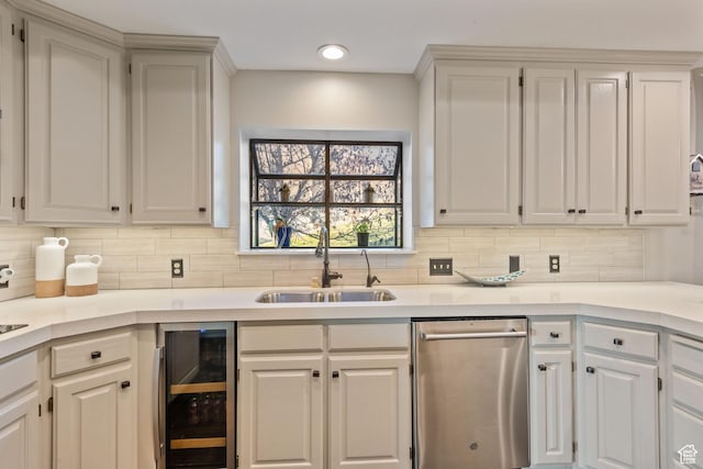 819 N Juniperpoint Dr, Salt Lake City, UT 84103 - kitchen featuring a sink, light countertops, wine cooler, backsplash, and stainless steel dishwasher