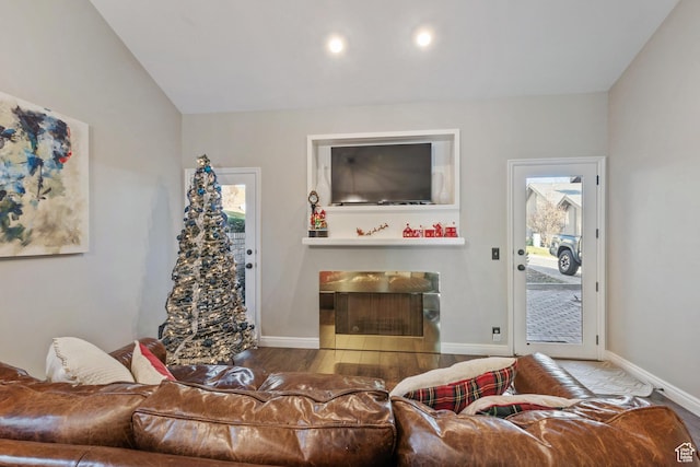 819 N Juniperpoint Dr, Salt Lake City, UT 84103 - living area with baseboards, wood finished floors, and lofted ceiling