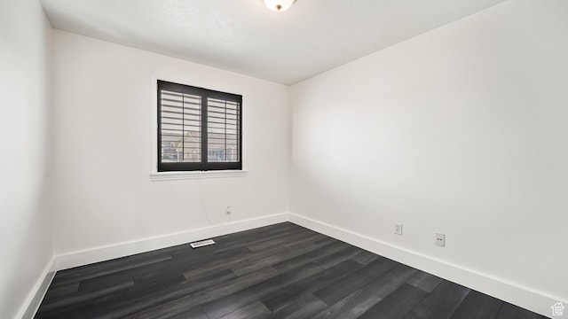 6258 W Graceland Way, West Jordan, UT 84081 - spare room with dark wood-type flooring and baseboards
