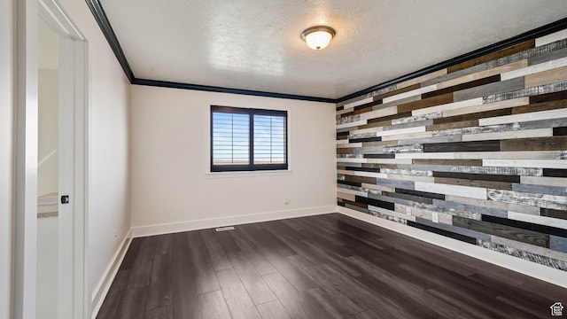 6258 W Graceland Way, West Jordan, UT 84081 - spare room with baseboards, wooden walls, a textured ceiling, dark wood-type flooring, and an accent wall