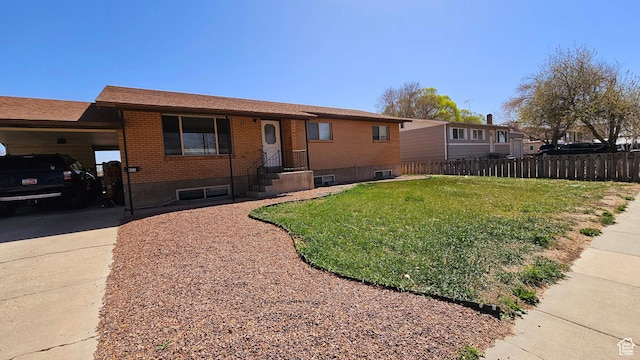 443 S 600 W, Vernal, UT 84078 - view of front of property featuring brick siding, an attached carport, and driveway