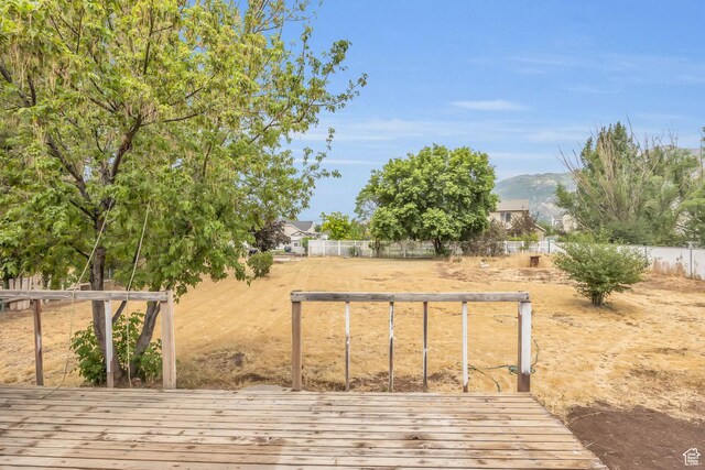 1962 E 7700 S, South Weber, UT 84405 - wooden deck featuring a mountain view and fence