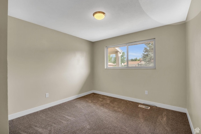 1962 E 7700 S, South Weber, UT 84405 - unfurnished room featuring baseboards, dark colored carpet, and visible vents