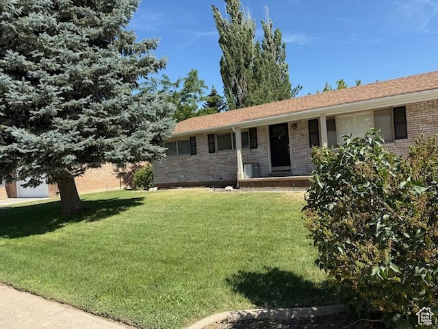 1962 E 7700 S, South Weber, UT 84405 - ranch-style home with brick siding and a front lawn