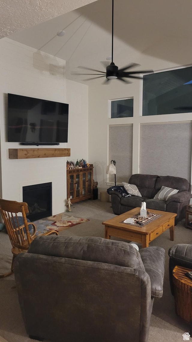 2345 E Cherry Ln, Layton, UT 84040 - carpeted living area with a fireplace and a ceiling fan