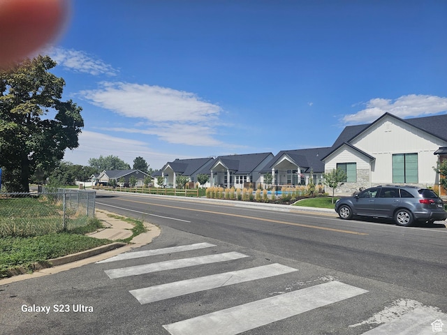 2345 E Cherry Ln, Layton, UT 84040 - view of road featuring curbs, a residential view, and sidewalks