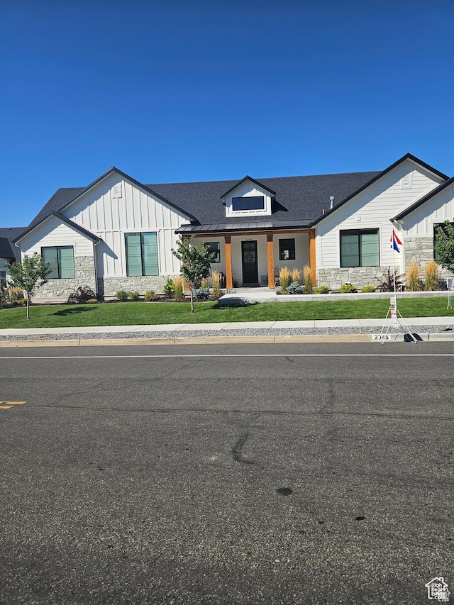 2345 E Cherry Ln, Layton, UT 84040 - modern farmhouse with board and batten siding and stone siding