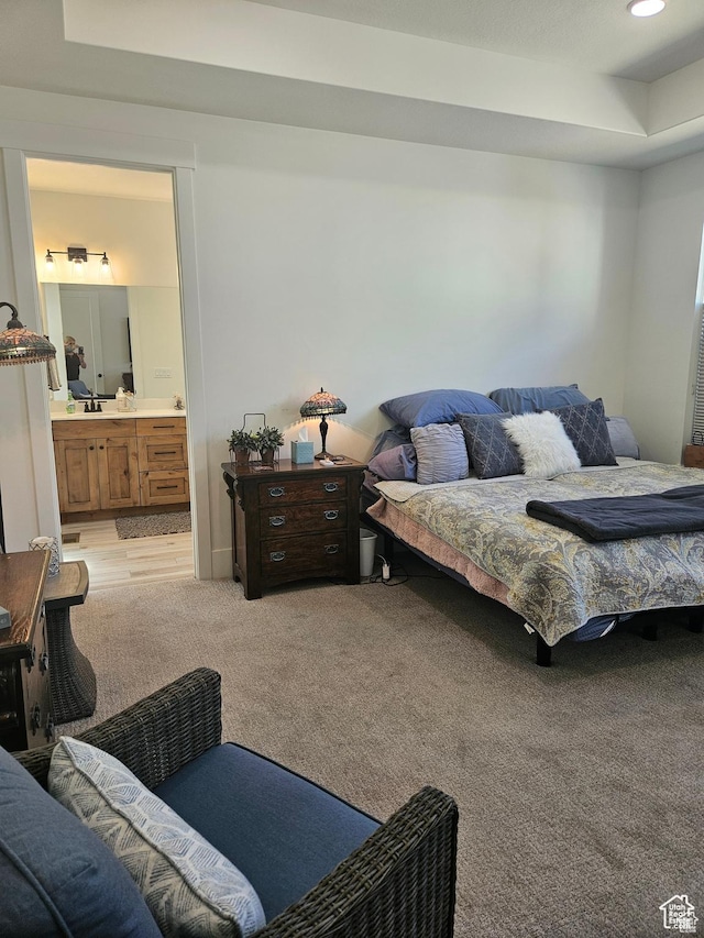 2345 E Cherry Ln, Layton, UT 84040 - bedroom featuring light carpet, ensuite bath, and a sink