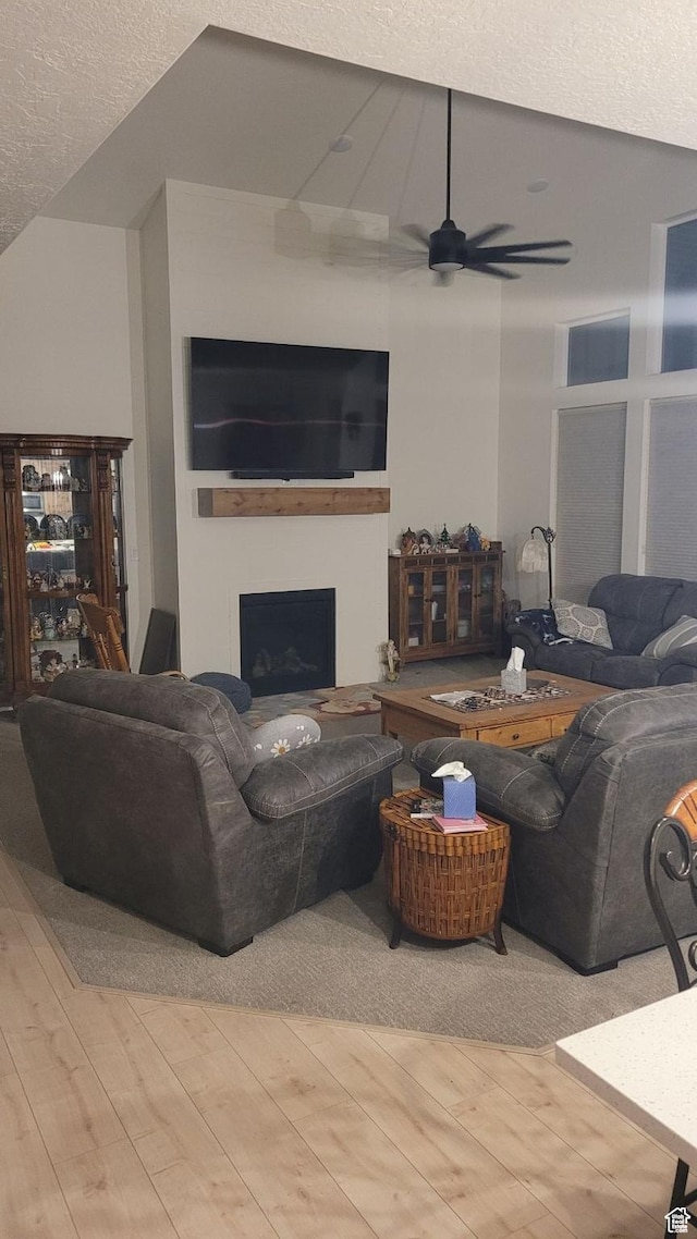 2345 E Cherry Ln, Layton, UT 84040 - living room featuring wood finished floors, a fireplace, and a ceiling fan