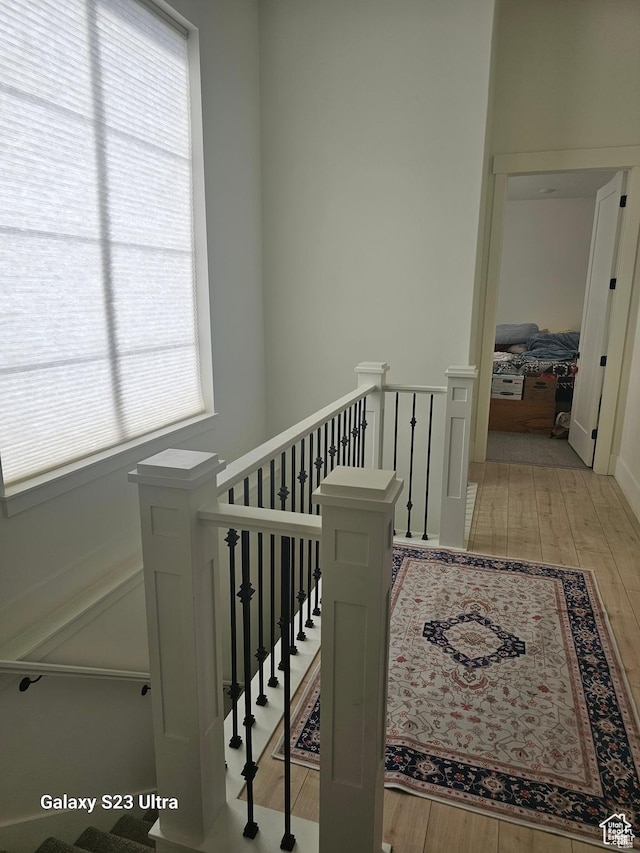 2345 E Cherry Ln, Layton, UT 84040 - staircase featuring a healthy amount of sunlight and wood finished floors