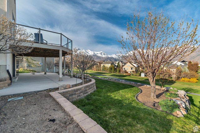 11968 N Ithica Dr, Highland, UT 84003 - view of yard with a deck with mountain view, a patio area, and stairway