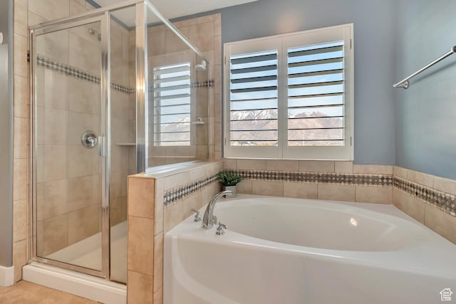 11968 N Ithica Dr, Highland, UT 84003 - bathroom with a garden tub and a stall shower