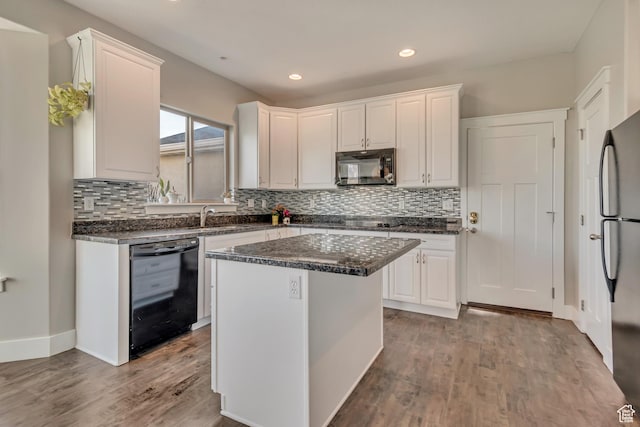 11968 N Ithica Dr, Highland, UT 84003 - kitchen with tasteful backsplash, white cabinets, black appliances, and wood finished floors