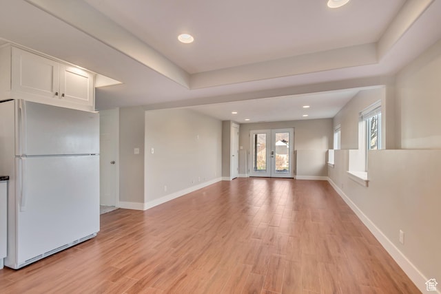 11968 N Ithica Dr, Highland, UT 84003 - unfurnished living room featuring recessed lighting, light wood-style floors, and baseboards