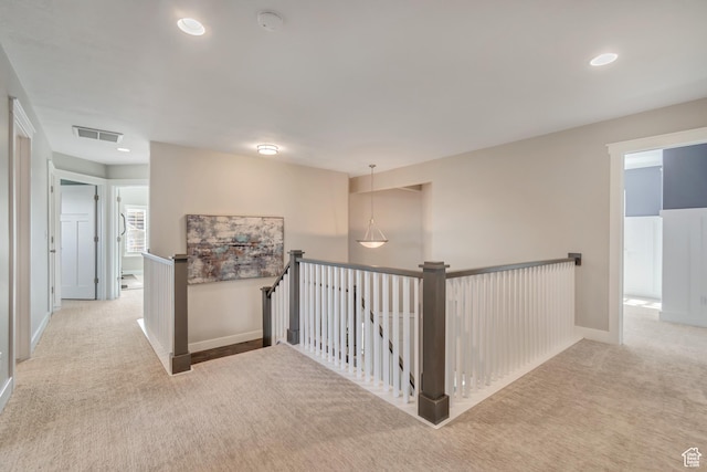 11968 N Ithica Dr, Highland, UT 84003 - hallway featuring visible vents, baseboards, an upstairs landing, recessed lighting, and carpet flooring
