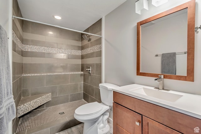 11968 N Ithica Dr, Highland, UT 84003 - bathroom featuring recessed lighting, tiled shower, vanity, and toilet