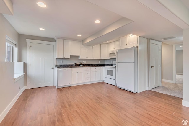 11968 N Ithica Dr, Highland, UT 84003 - kitchen featuring baseboards, light wood-type flooring, white appliances, dark countertops, and white cabinetry