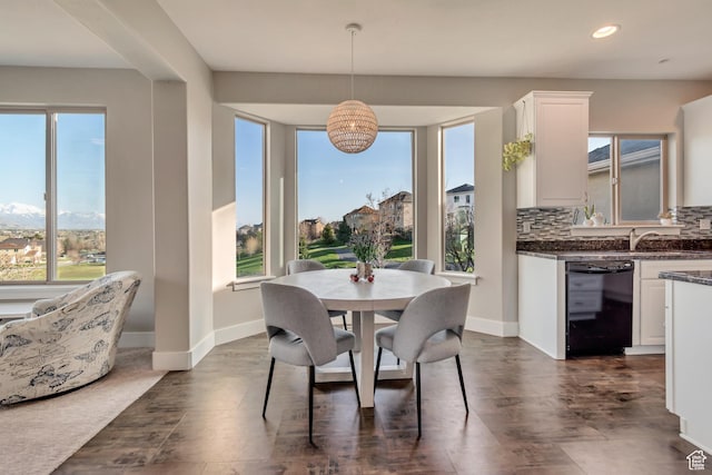 11968 N Ithica Dr, Highland, UT 84003 - dining room with a chandelier, recessed lighting, dark wood-style flooring, and baseboards