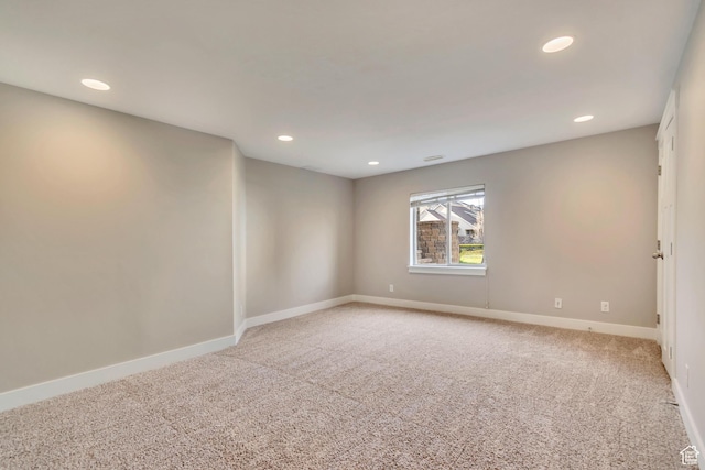 11968 N Ithica Dr, Highland, UT 84003 - unfurnished room featuring light colored carpet, baseboards, and recessed lighting